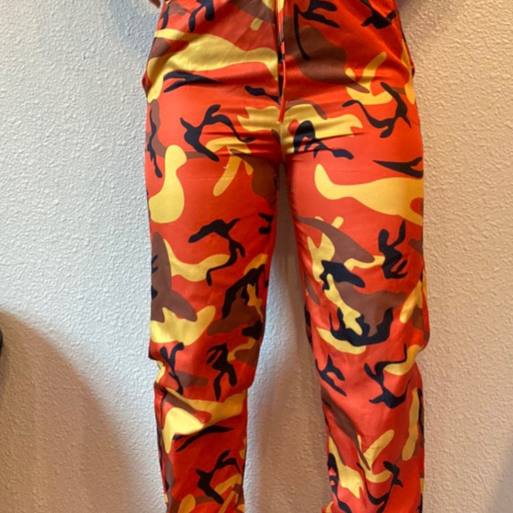 Orange windbreaker camo pants